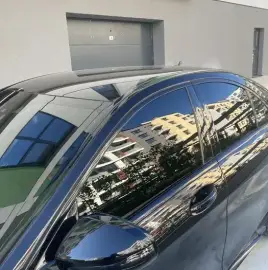 Tinting of car windows, installation of sun protection film