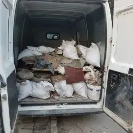 Hauling away construction waste basements attics cleaning garbage