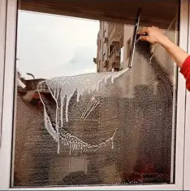 Professional cleaning of windows and shop windows