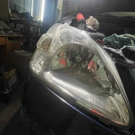 Headlight polishing and installation of PPF protective film
