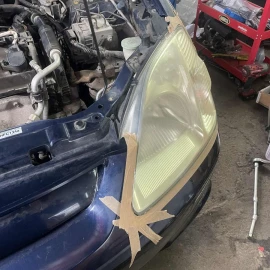 Headlight polishing and installation of PPF protective film