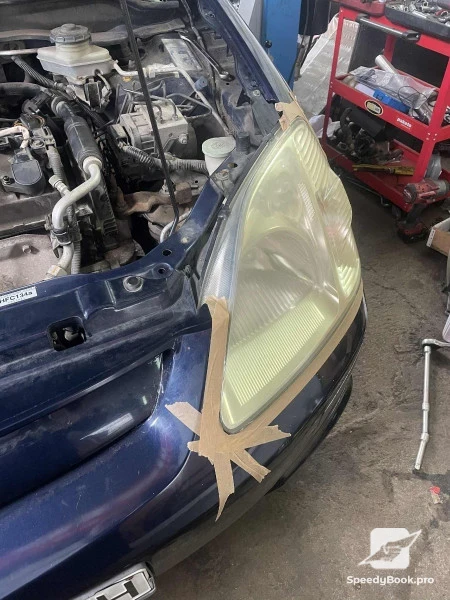 Headlight polishing and installation of PPF protective film