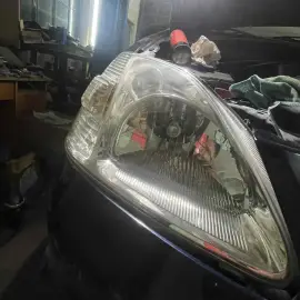 Headlight polishing and installation of PPF protective film