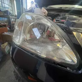 Headlight polishing and installation of PPF protective film