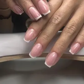 Manicure with gel nail polish and levelling with base