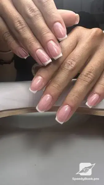 Manicure with gel nail polish and levelling with base